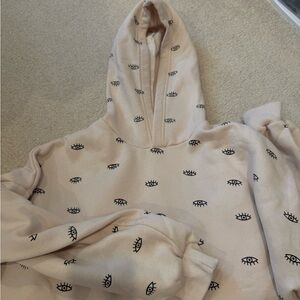 Adika Cream Hoodie with Eye Design